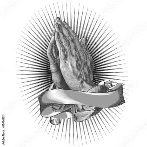 Illustration of praying hands surrounded by scrolls for religious messages, hands of a saint praying with parchment and celestial light in grayscale