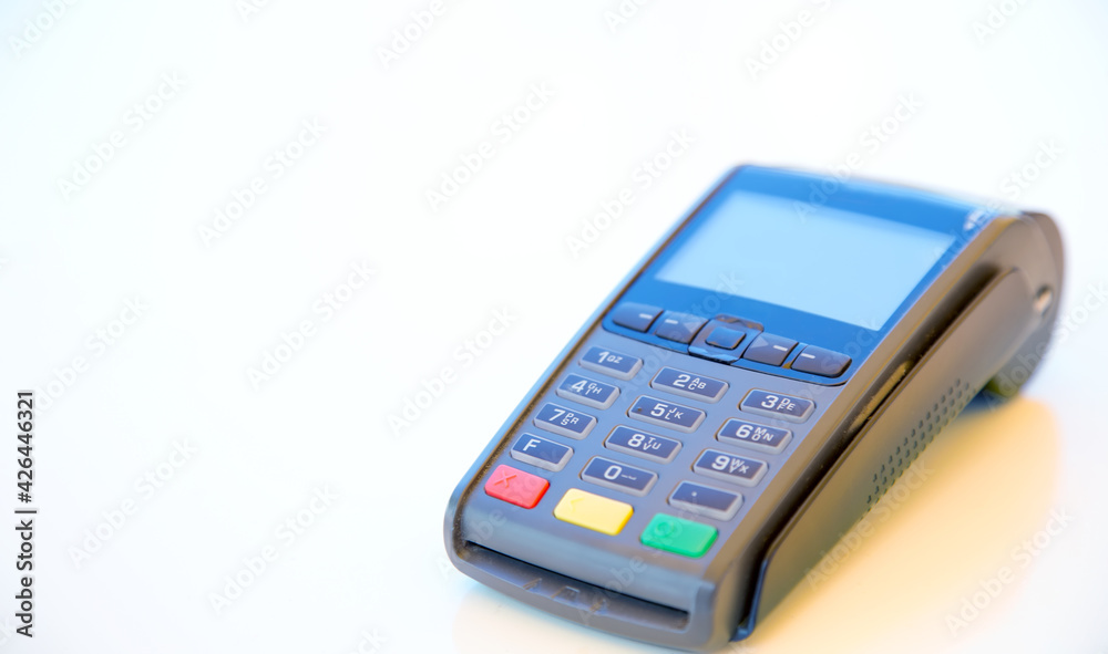 Close-up machine to pay credit card. Credit card reader swipe through terminal for payment. Paying by credit card. Close-up machine to pay credit card. Credit card reader swipe through terminal for payment. Paying by credit card.