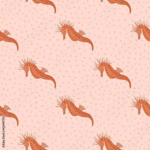 Exotic seahorse seamless doodle pattern in pink tones. Dotted background. Underwater animal backdrop.