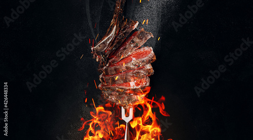 Fényképezés grilled beef steak on a dark background
