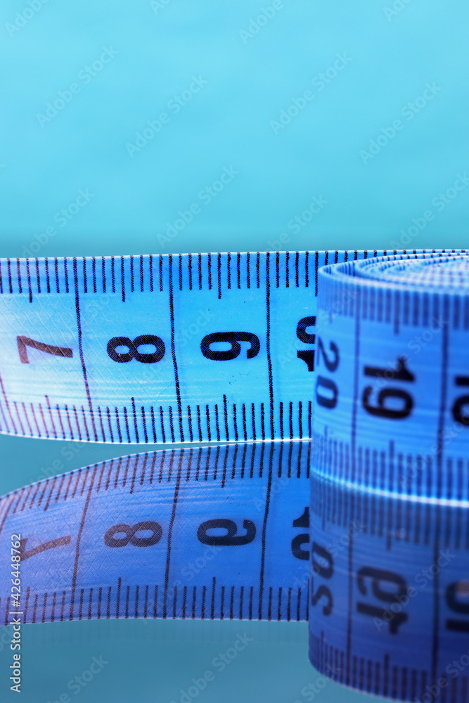 close-up colorful measuring tape on a background close-up colorful measuring tape on a background