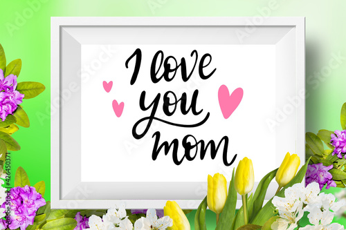 I love you mom. Happy Mother's Day card or banner with yellow tulips, white cherry and beautiful rhododendron flowes.