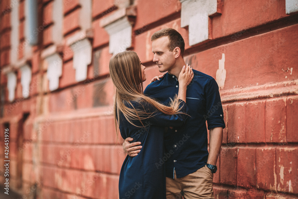 Portrait of emotional young couple hugging each other tightly, boyfriend and girlfriend, love you so much, strong affection in relationship