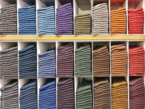 The fabric is folded by the seller. Placed in a showcase to make it easy for customers to buy.