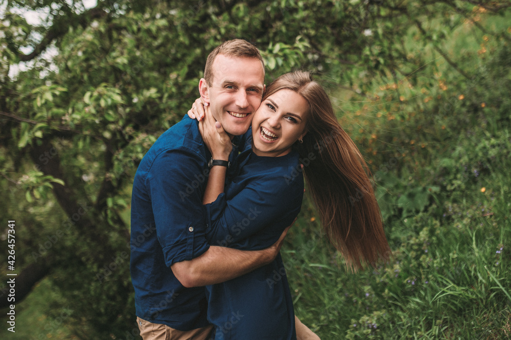 Portrait of emotional young couple hugging each other tightly, boyfriend and girlfriend, love you so much, strong affection in relationship