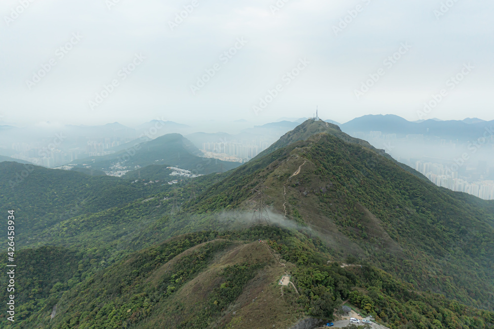 Beautiful misty morning landscape at Kowloon Peak, Hong Kong Beautiful misty morning landscape at Kowloon Peak, Hong Kong