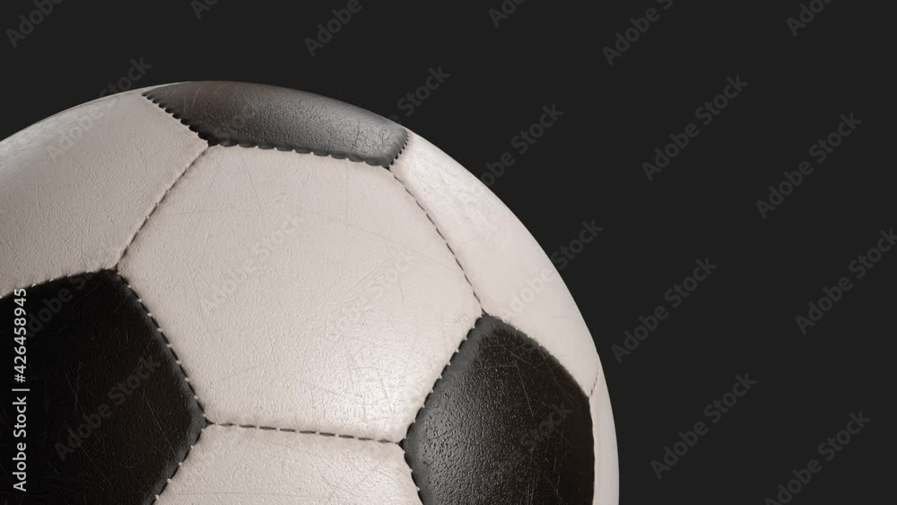 Rotating soccer ball isolated on black background. Sports football. Alpha channel 3d illustration
