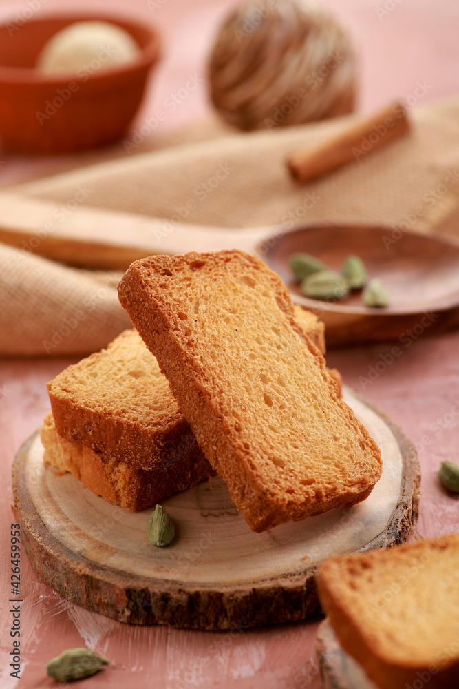 Healthy and Fresh Food - Indian Milk Rusk Toast on Wooden Tray Healthy and Fresh Food - Indian Milk Rusk Toast on Wooden Tray