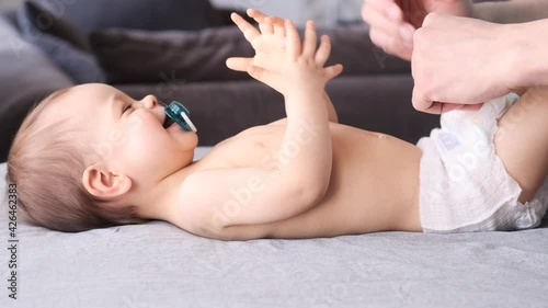 Father massage the child and knead his belly