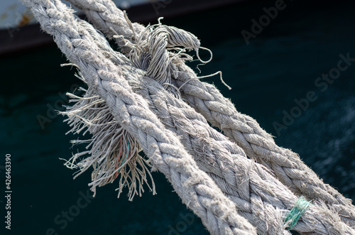 Marine rope. Moored ship. Synthetic fiber. Rope knot. Sisal rope.