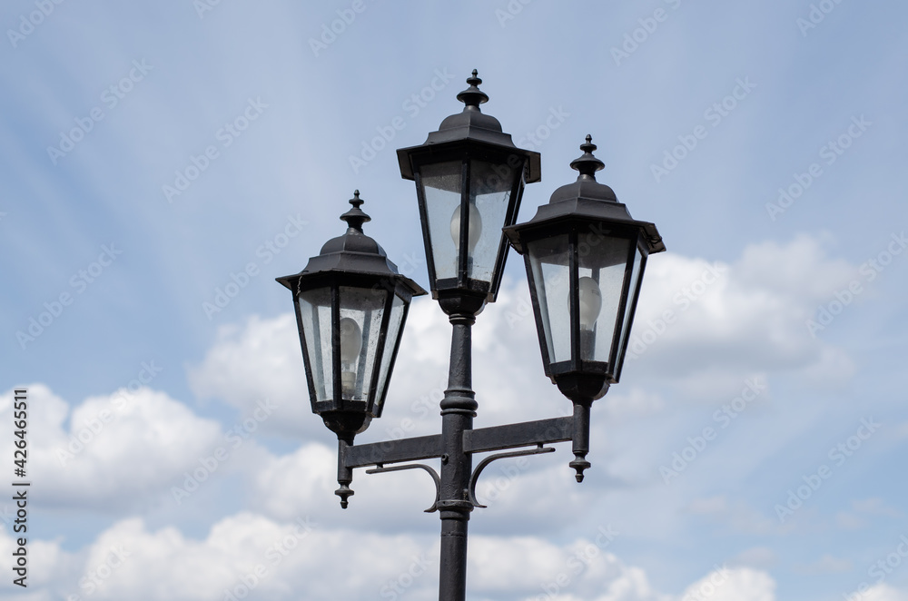 Vintage street lamp. Street lighting. Architecture. Searchlight.