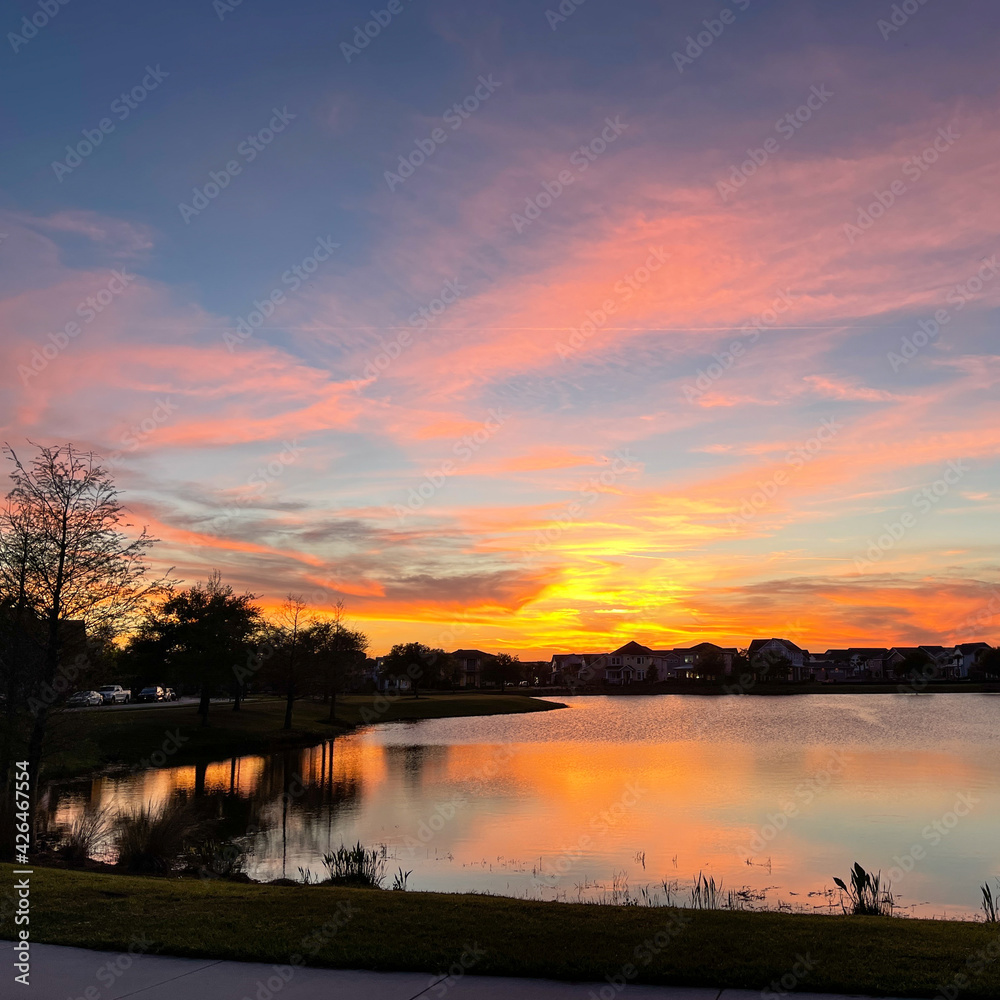 Beautiful pink, orange and blue sunset reflecting on a lake