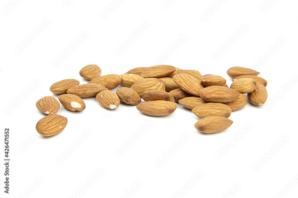 Almond nuts isolated on white background. Heap of almonds Almond nuts isolated on white background. Heap of almonds