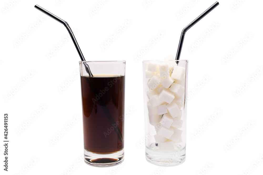 Glass of carbonated sweet drink versus glass of sugar isolated on white background. Sugar addiction Glass of carbonated sweet drink versus glass of sugar isolated on white background. Sugar addiction