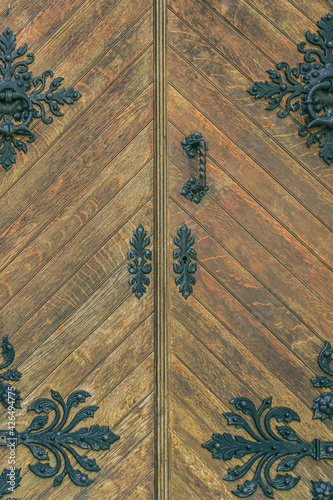 Wrought Iron and Wooden Double Door Background