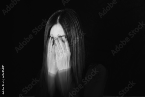 Tableau sur toile Blurred female portrait in the dark.
