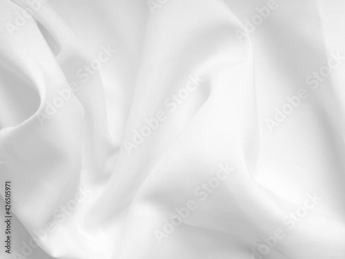 abstract white background on isolated, white waves from curtain use as texture or wallpaper.