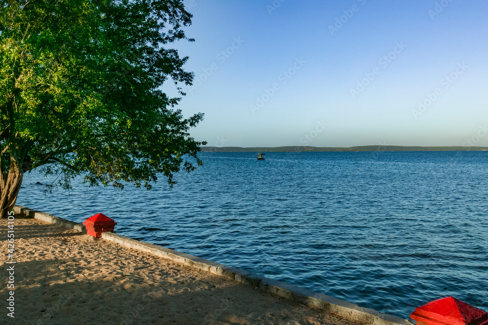 The blue waters of Cienfuegos Bay seen from a waterfront park, Punta Gorda, Cuba. The blue waters of Cienfuegos Bay seen from a waterfront park, Punta Gorda, Cuba.