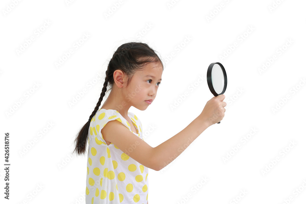 Asian little child girl looking through a magnifying glass to beside isolated on white background Asian little child girl looking through a magnifying glass to beside isolated on white background