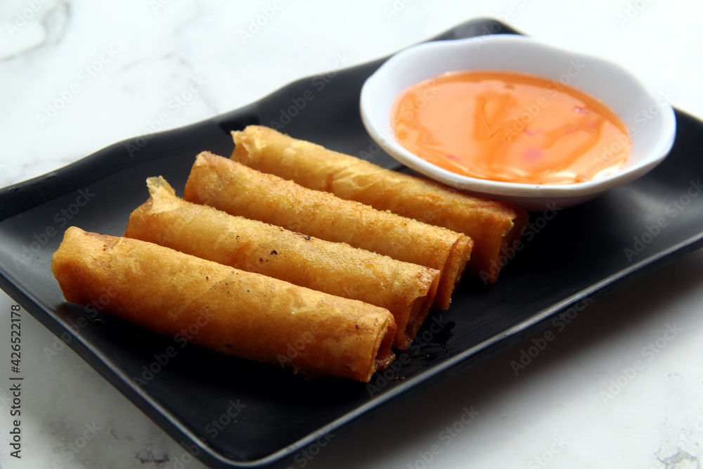 Freshly cooked Filipino food called Lumpiang Shanghai Freshly cooked Filipino food called Lumpiang Shanghai