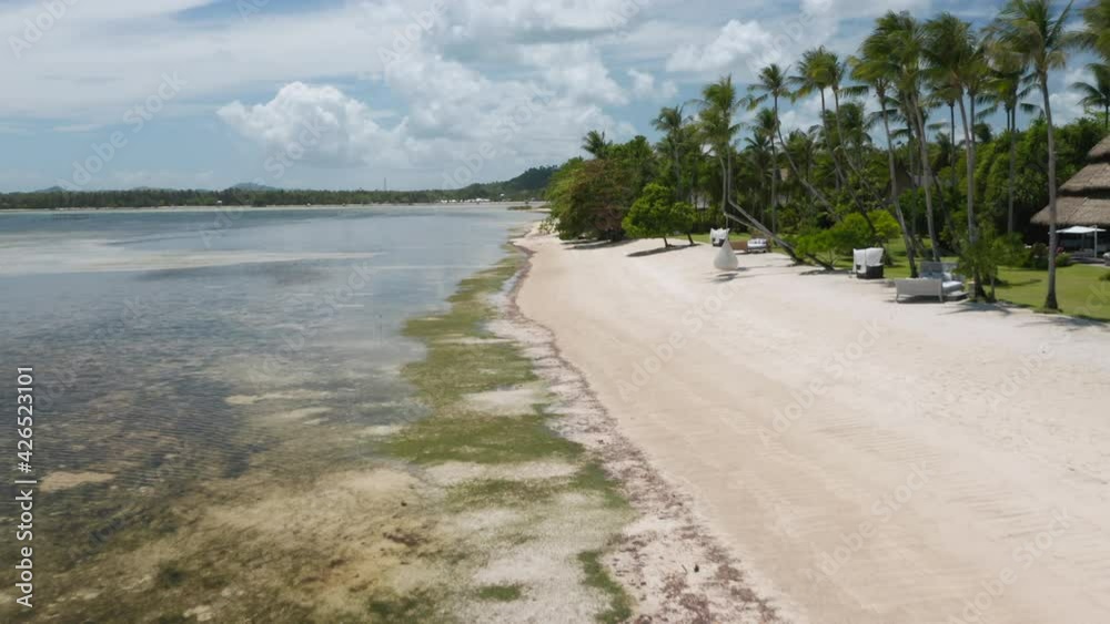 Aerial showing Private beach of Nay Palad Hideaway on Siargao Island, Philippines.