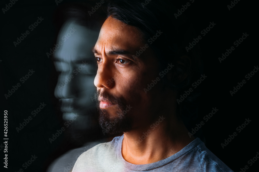 Portrait of a man of Latino ethnicity and his soul coming out of him. A Latin man with his spirit - obrazy, fototapety, plakaty 