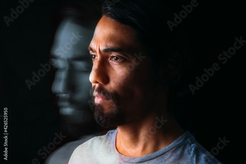 Photography Portrait of a man of Latino ethnicity and his soul coming out of him