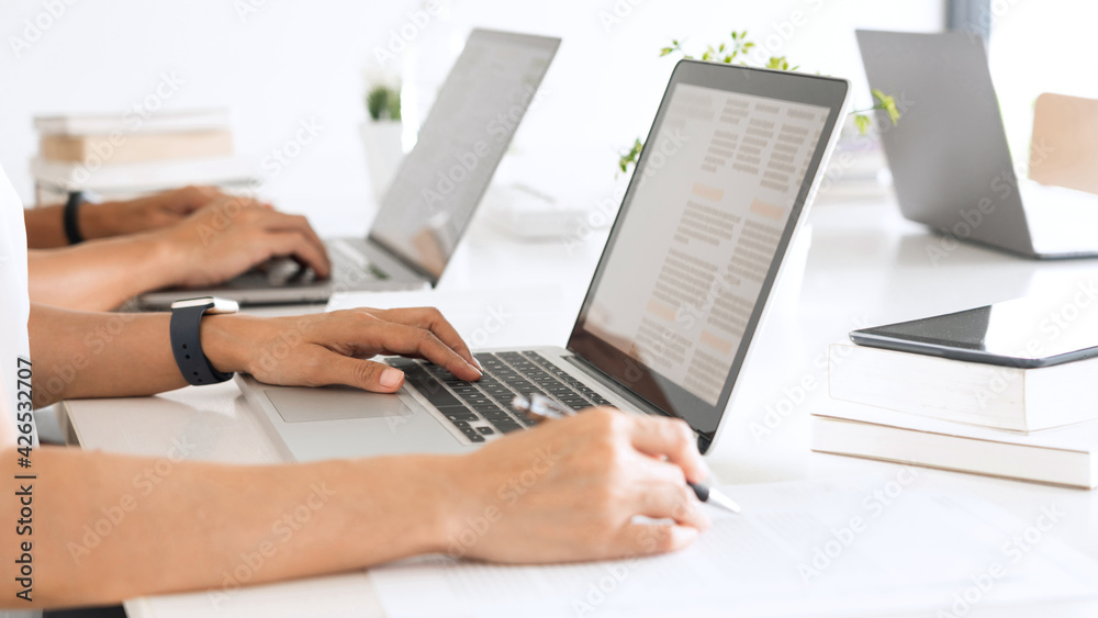 business man financial inspector and secretary making report and brainstorming with colleague in a modern co-working space