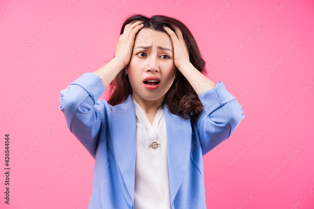 Image of Asian businesswoman on pink bakcground Image of Asian businesswoman on pink bakcground