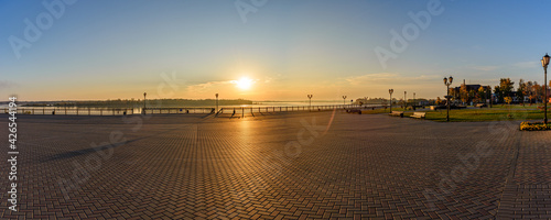 Panorama of the rising sun on the embankment of the Kama River in Sarapul. Udmurt Republic, Russia.