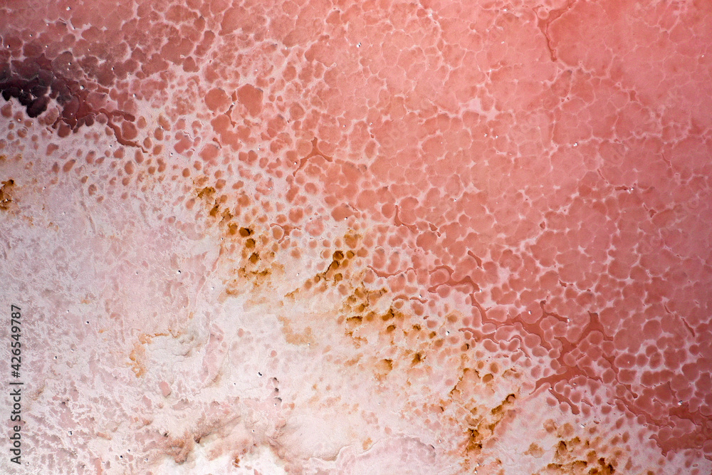 white foam lake and pink salt water white foam lake and pink salt water