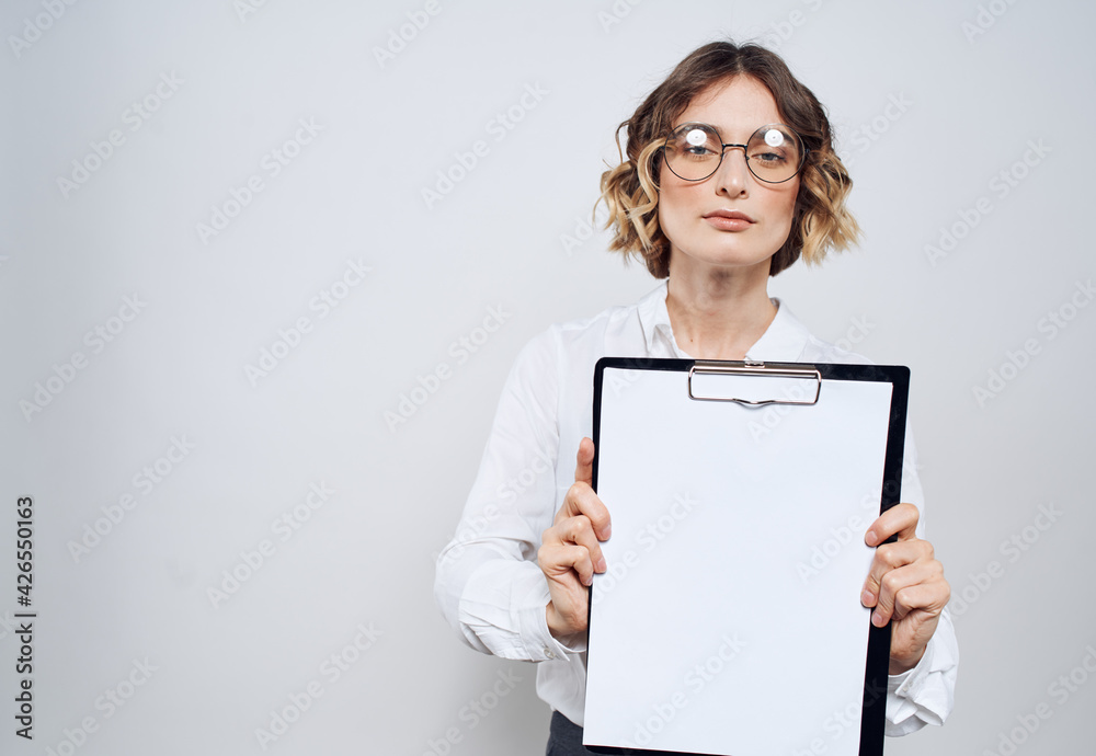 woman with white sheet of paper folder documents gray background woman with white sheet of paper folder documents gray background
