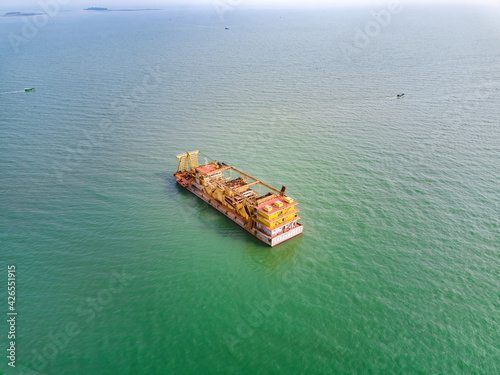 Aerial photography of giant oil tanker sand mining ship at sea