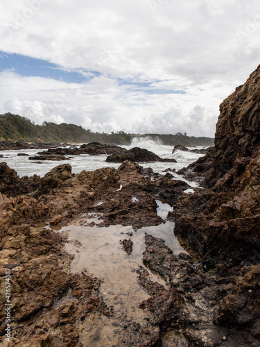 Rocky coastline of Nobbys Beach at Port Macquarie, Australia.