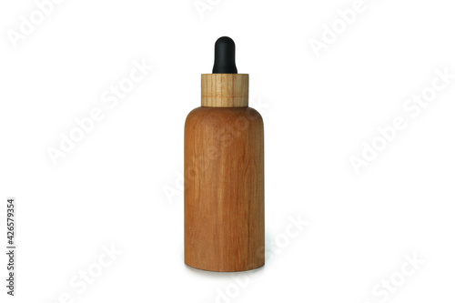 Wooden dropper bottle with oil isolated on white background