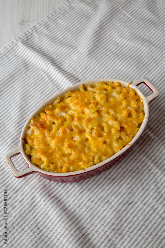 Homemade Macaroni and Cheese Pasta on cloth, side view.