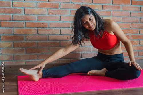 Young indian woman doing yoga
