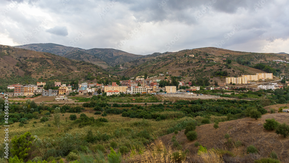 Panoramic view of a small village between the mountains 