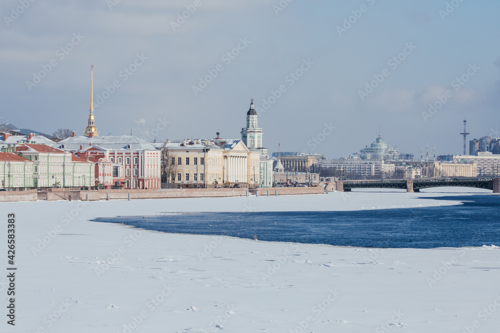 Picturesque view of the Saint Petersburg city center with Palace Bridge and Vasilievsky Island in spring.