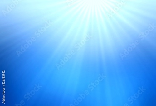 Winter sunshine bright blue blurred background. Glowing cold sky simple pattern.