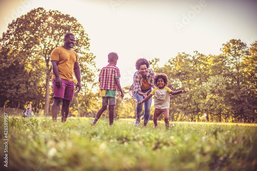 African American family having fun outdoors.