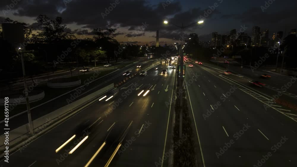 Time lapse of Traffic jam in 23 de Maio Avenue, near Ibirapuera Park at night Time lapse of Traffic jam in 23 de Maio Avenue, near Ibirapuera Park at night