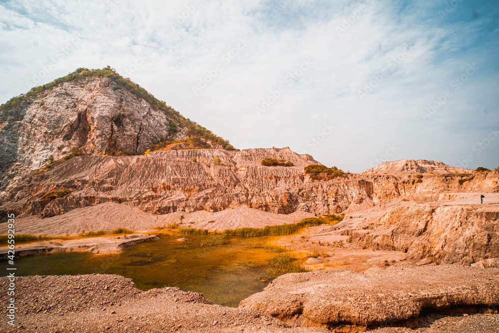 Fototapeta premium Blue summer sky over the Grand Canyon old quarry Thailand