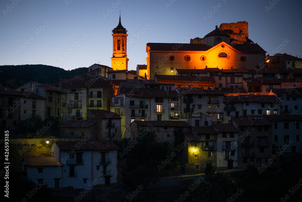 Beautiful night view of Linares De Mora (Teruel, Spain), with its church and its picturesquely illuminated houses