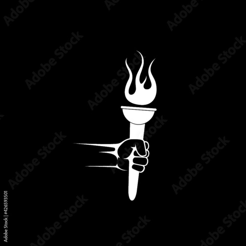 Hand holding torch icon isolated on dark background