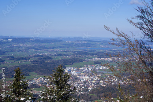 Village Hinwil, Switzerland, seen from mountain Bachtel. Photo taken April 8th, 2021.