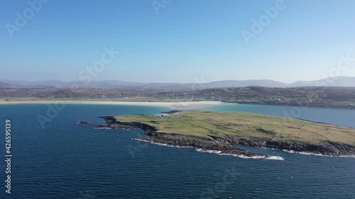 Aerial view of Inishkeel Island by Portnoo next to the the awarded Narin Beach in County Donegal, Ireland - Monk building remains photo