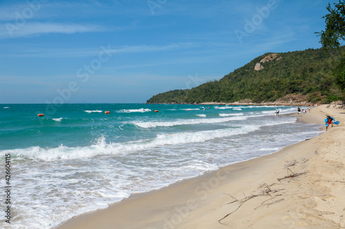 person walking on the beach