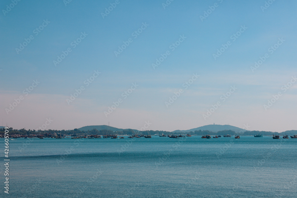 High point view for looking at the location of Sattahip Naval Base with clear sky and blue sea. Sea view and the island close to Sattahip Naval Base, Thailand. High point view for looking at the location of Sattahip Naval Base with clear sky and blue sea. Sea view and the island close to Sattahip Naval Base, Thailand.
