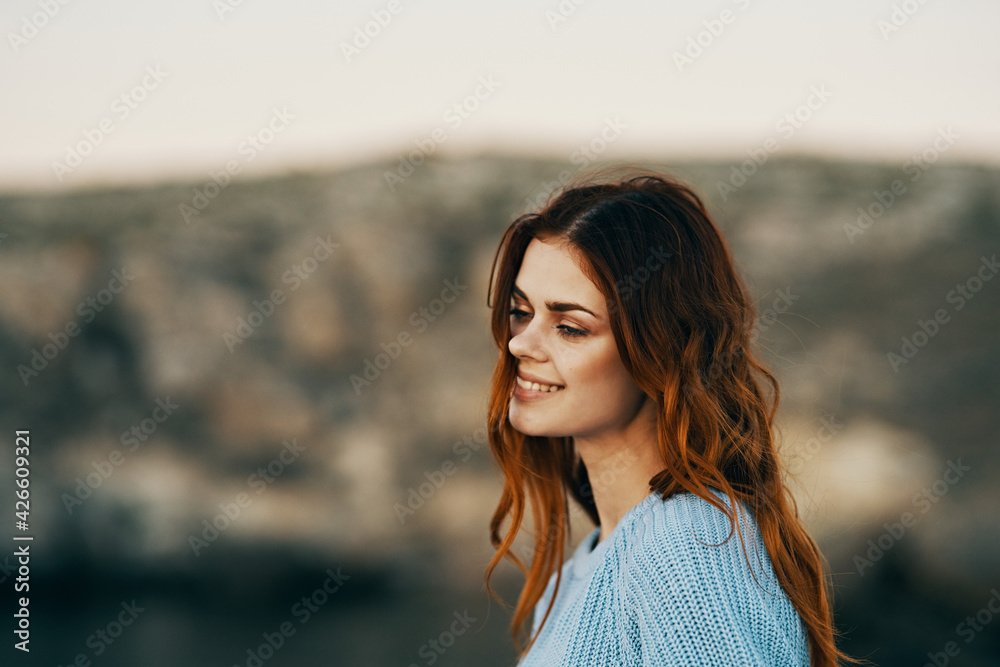 red-haired woman outdoors travel glamor fresh air red-haired woman outdoors travel glamor fresh air
